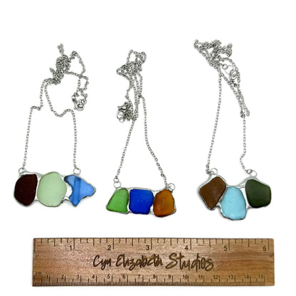 Cyn Elizabeth Studios - Shoreline Souvenir Sea Glass Necklace: Carded on white cardstock - PMA Store at the Portland Museum of Art, Maine