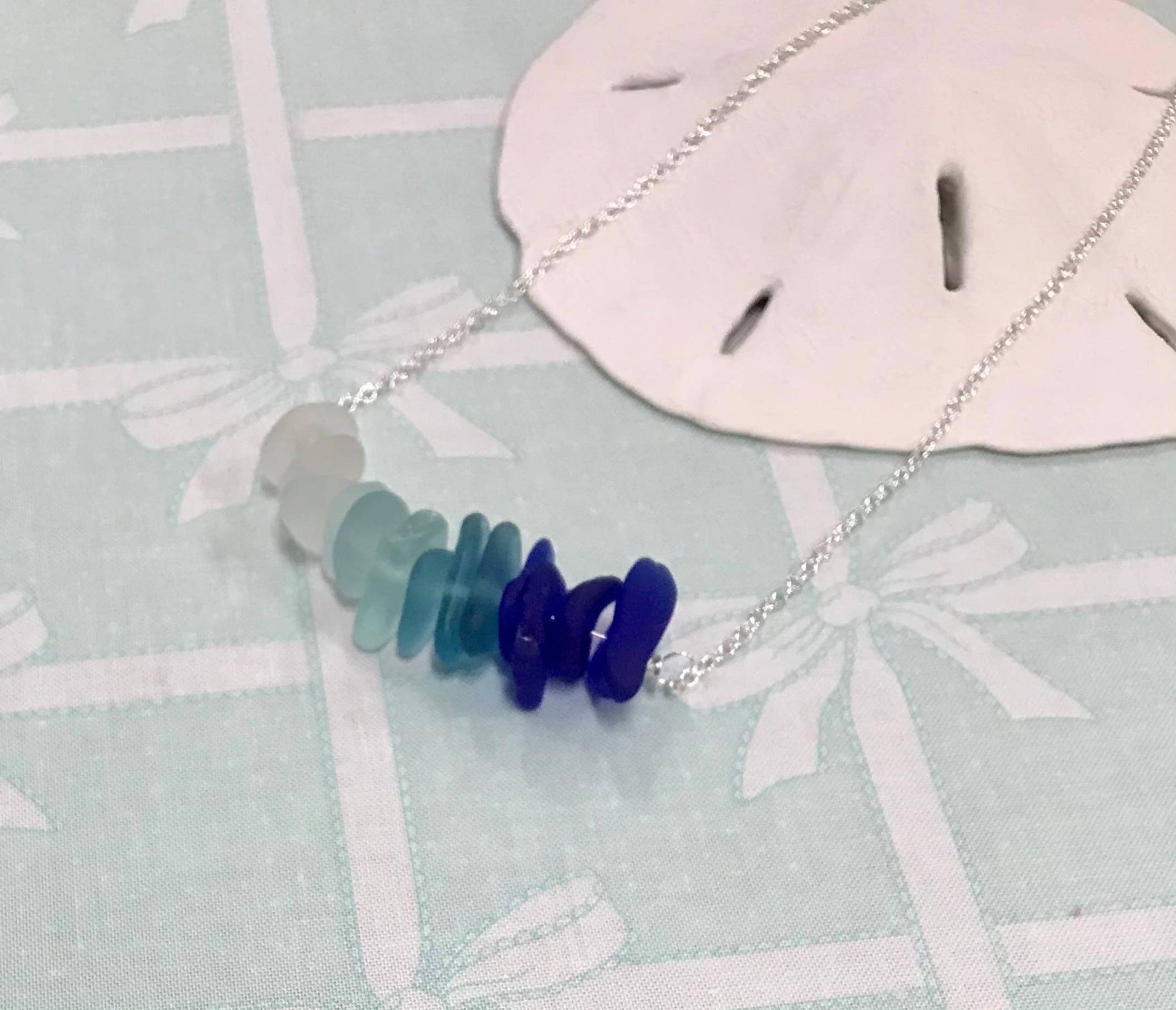 Cyn Elizabeth Studios - The Sea Bar- Sea Glass Statement Necklace: Carded on white cardstock - PMA Store at the Portland Museum of Art, Maine