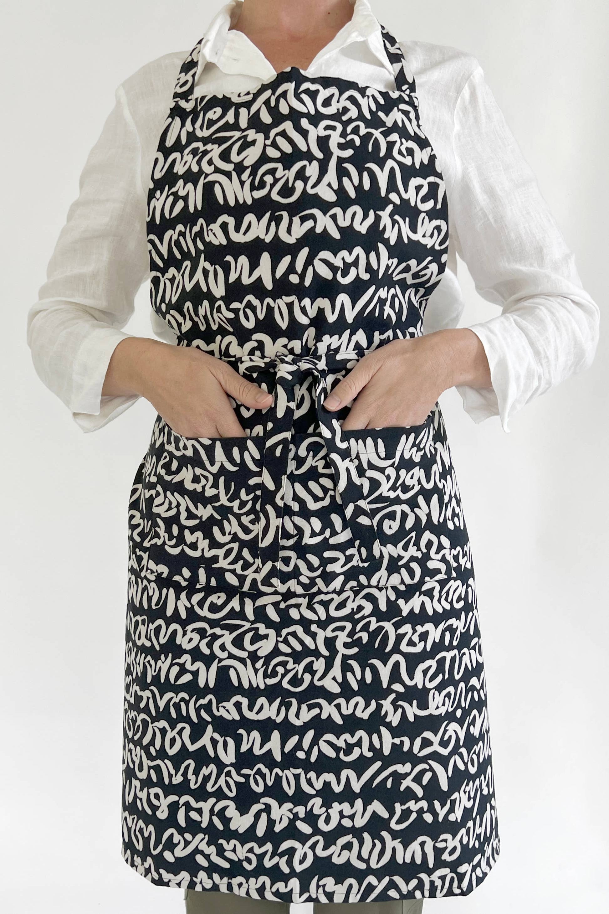 See Design - Apron: Small Totem Orange/Yellow - PMA Store at the Portland Museum of Art, Maine