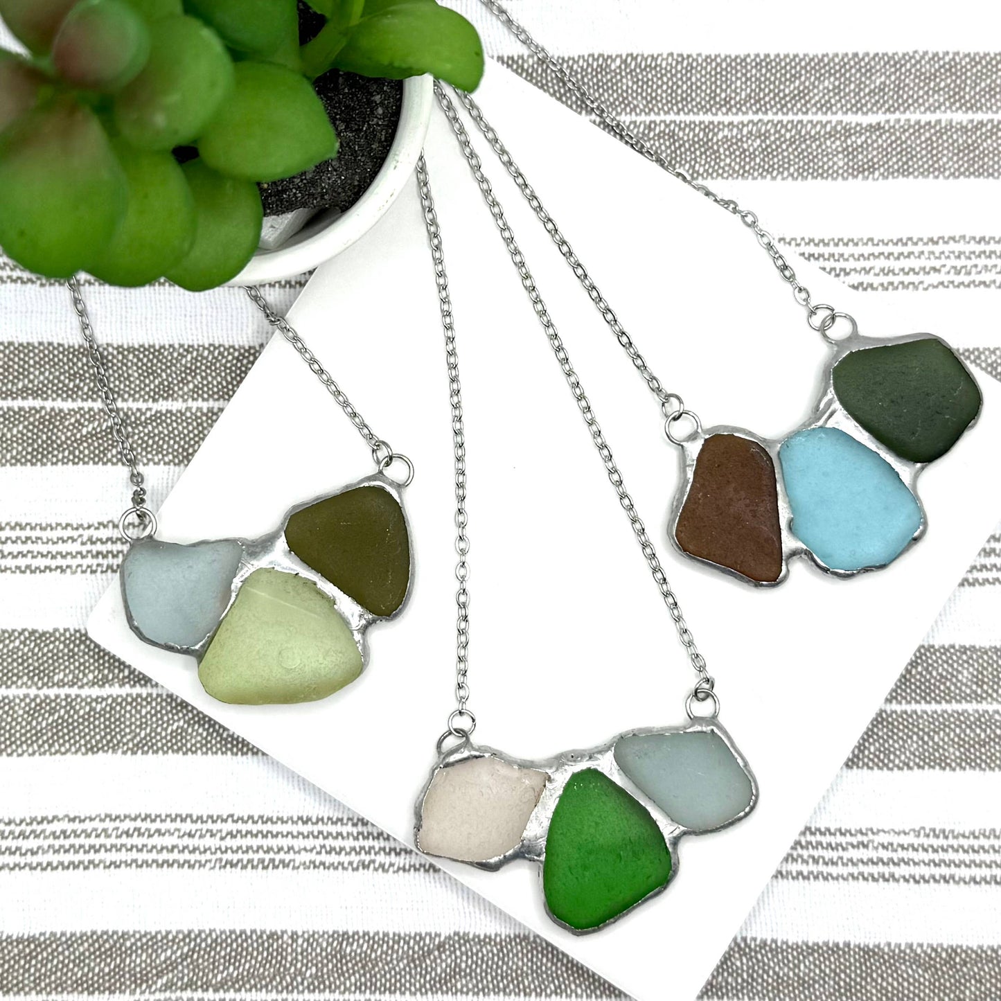 Cyn Elizabeth Studios - Shoreline Souvenir Sea Glass Necklace: Carded on white cardstock - PMA Store at the Portland Museum of Art, Maine