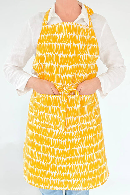 See Design - Apron: Small Totem Orange/Yellow - PMA Store at the Portland Museum of Art, Maine