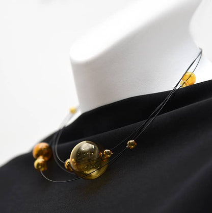 Pursuits - Cumulus Necklace: Gold Grey