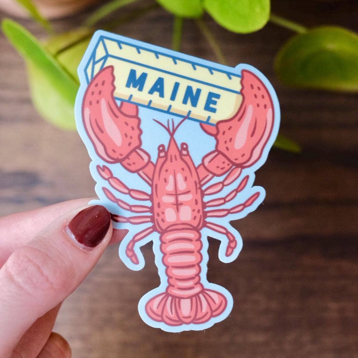 Stuck on Maine - Maine Lobster & Butter Sticker — Vinyl, Waterproof Sticker - PMA Store at the Portland Museum of Art, Maine